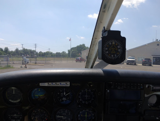 View of windshield with compass not tied into dashboard.